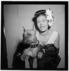 Billie Holiday and dog, black and white